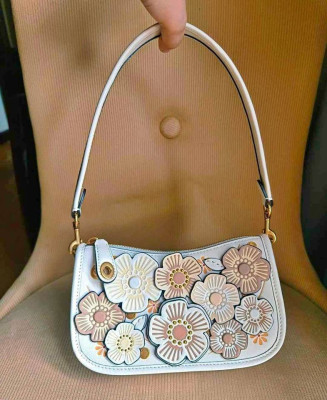 Coach swinger 20 tea rose Kili-kili bag