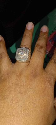 Silver bracelet at ring