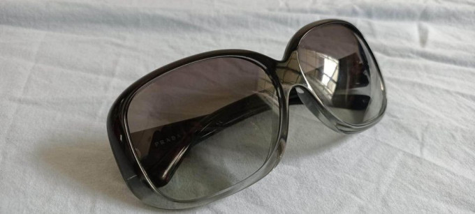 Pandora bracelet & Prada sunglasses