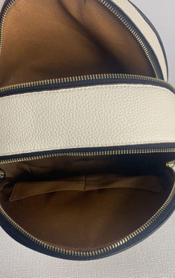 DISNEY X COACH  MINI COURT BACKPACK WITH CRUELLA MOTIF