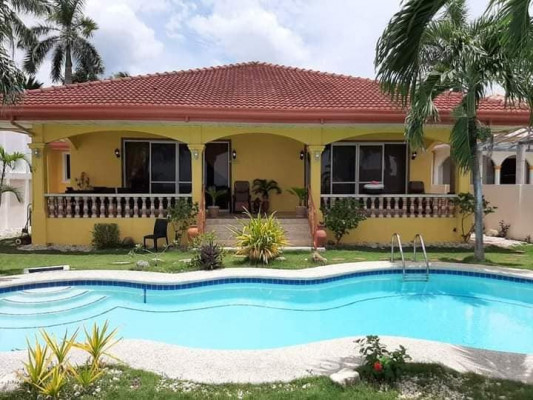 Beach lot property with fully air conditioned house for sale