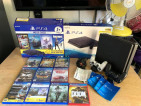 Ps4 1 terabyte with 11 cds 5dl games 2 ds4 controller