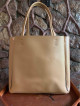 Espandable beige tote bag