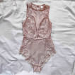 Lace bodysuit with snap