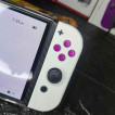 Switch OLED with 4 physical game and 11 digital games for sale