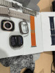 Apple watch Ultra 49 mm Titanium ( GPS+CELLULAR) With Orange Alpine Loop