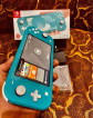 Nintendo switch lite complete with games
