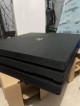 Ps4 pro 1TB complete with 4 physical games