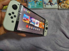 NINTENDO SWITCH OLED WITH GAMES