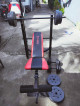 Matrix flatbench with barbell and dumbells