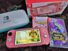 Selling Nintendo Switch Lite with 2 game