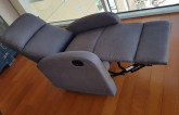 Slim and modern recliner in elegant grey fabric