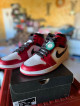 Jordan 1 Mid Chicago White Heel