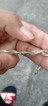 Silver bracelet at ring