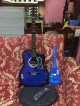 Direct Supplier Buy brandnew acoustic guitar with free ukulele and moree.