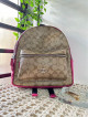 Coach Charlie Backpack in Signature Canvas - Pink