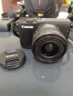 Canon Eos M10 Mirrorless Camera With Enovation Tripos