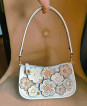 Coach swinger 20 tea rose Kili-kili bag