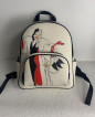 DISNEY X COACH  MINI COURT BACKPACK WITH CRUELLA MOTIF