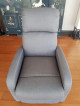Slim and modern recliner in elegant grey fabric