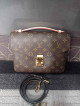 lv pochette metis