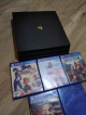 Ps4 pro 1 terabyte with 5 games for sale